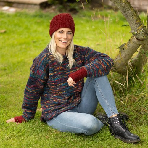 Teal electric jumper with cable beanie and matching handwarmers